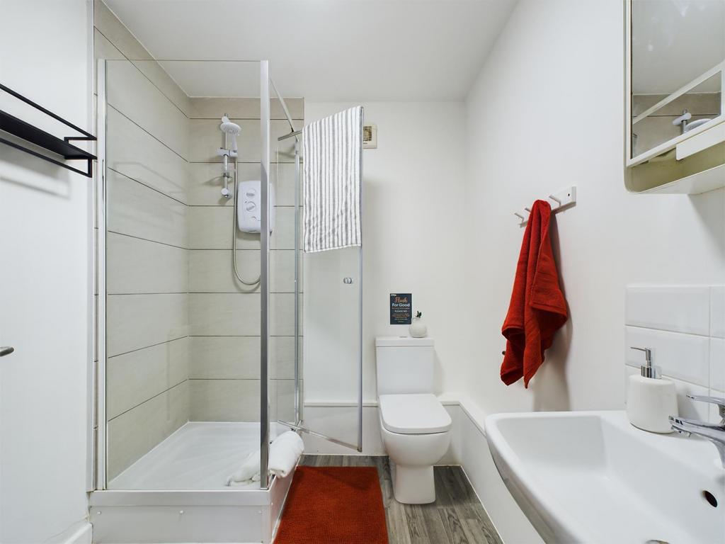 Bright and modern bathroom with a spacious show...