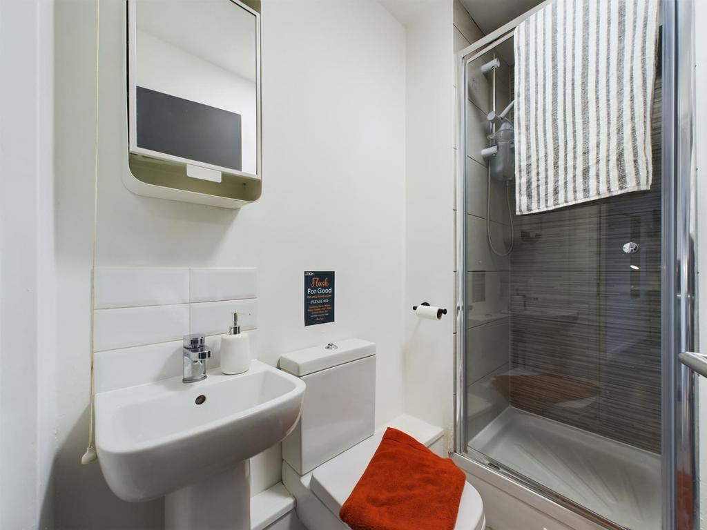 A modern, well-maintained bathroom featuring a ...
