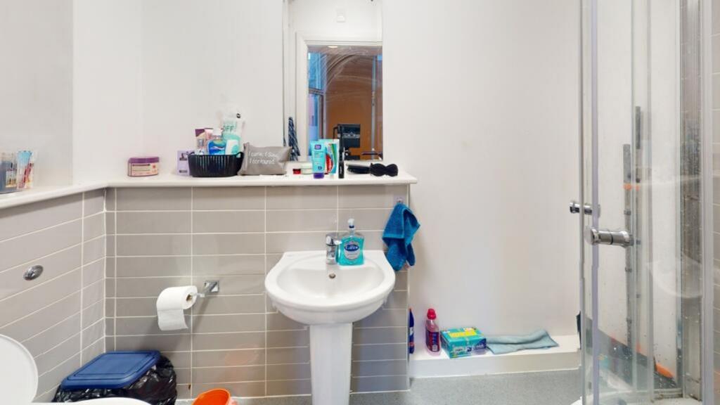 Bright and functional bathroom featuring a mode...