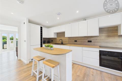 undefined, “An attractive and well-designed townhouse, perfect for families, with four bedrooms and two allocated parking spaces.”