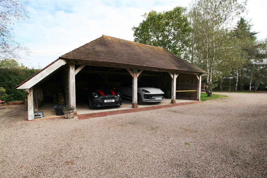 Theoldcoachhouse,triplecarportlogstore.JPG