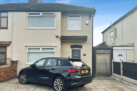 11 Nicholas Road, Widnes, WA8 8ST