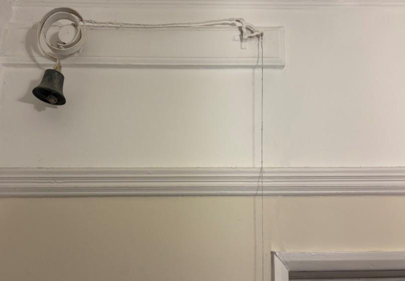Detail of bell pulley system hallway