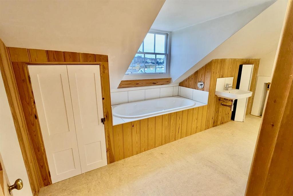 Double Ended Bathtub with Rooftop Views.jpeg