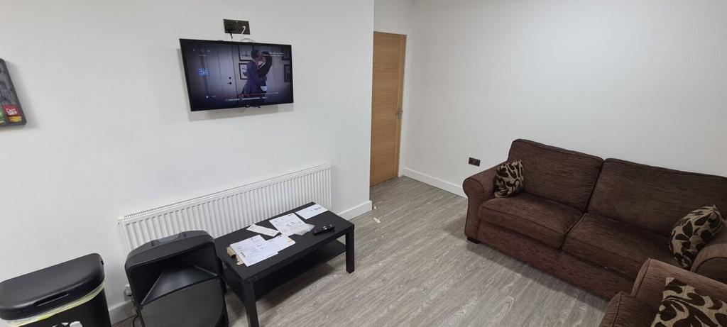 A modern and inviting living room featuring a c...