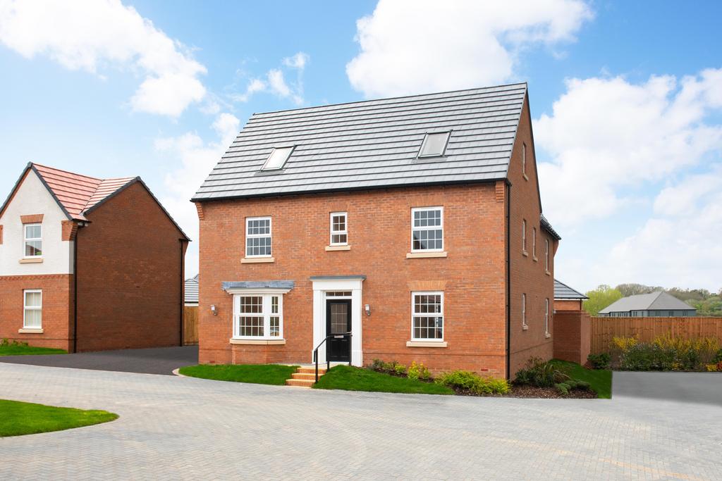 External view of the three-storey, five bedroom...