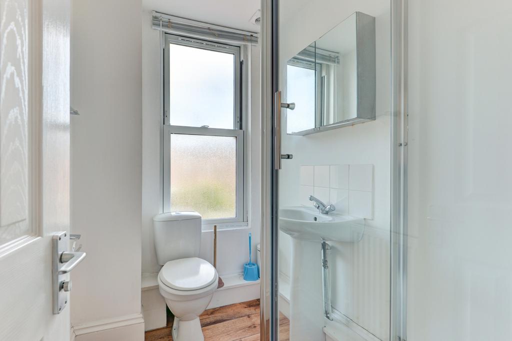 A bright and well-maintained bathroom featuring...