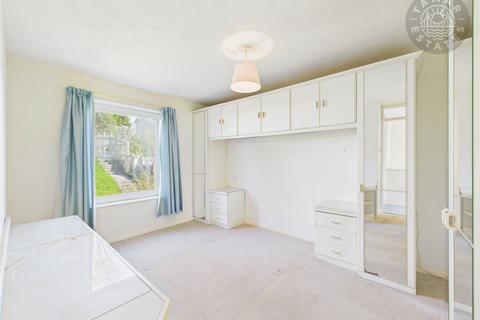 undefined, “Spacious end-terrace in a sought-after coastal town.”