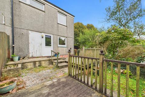 undefined, “Spacious end-terrace in a sought-after coastal town.”