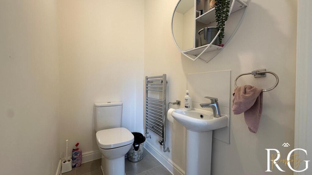 A clean and well-maintained bathroom featuring ...