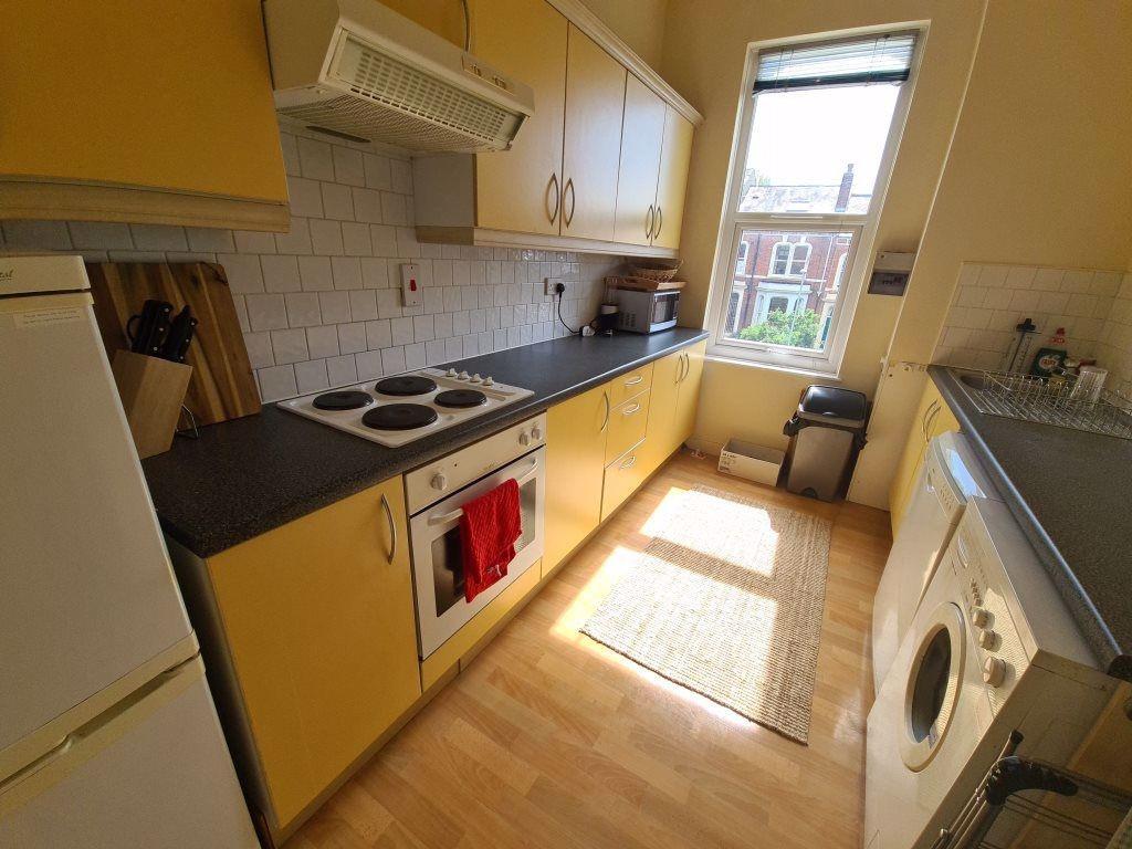 Bright and functional kitchen featuring modern ...