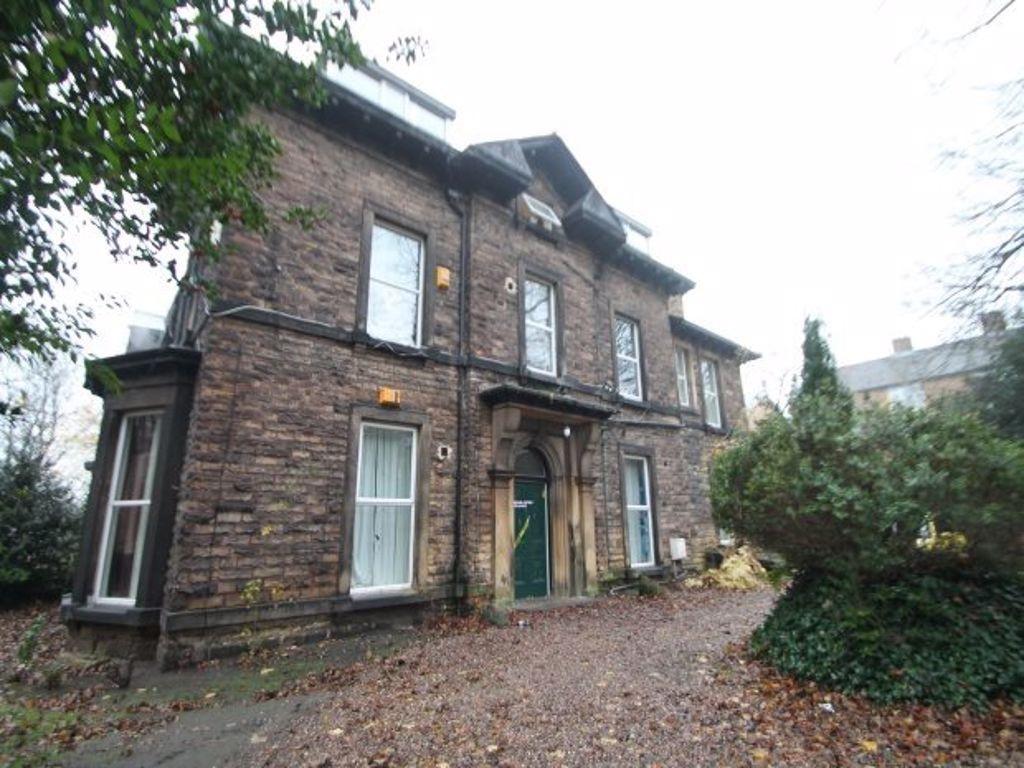 A charming traditional brick front of a semi-de...