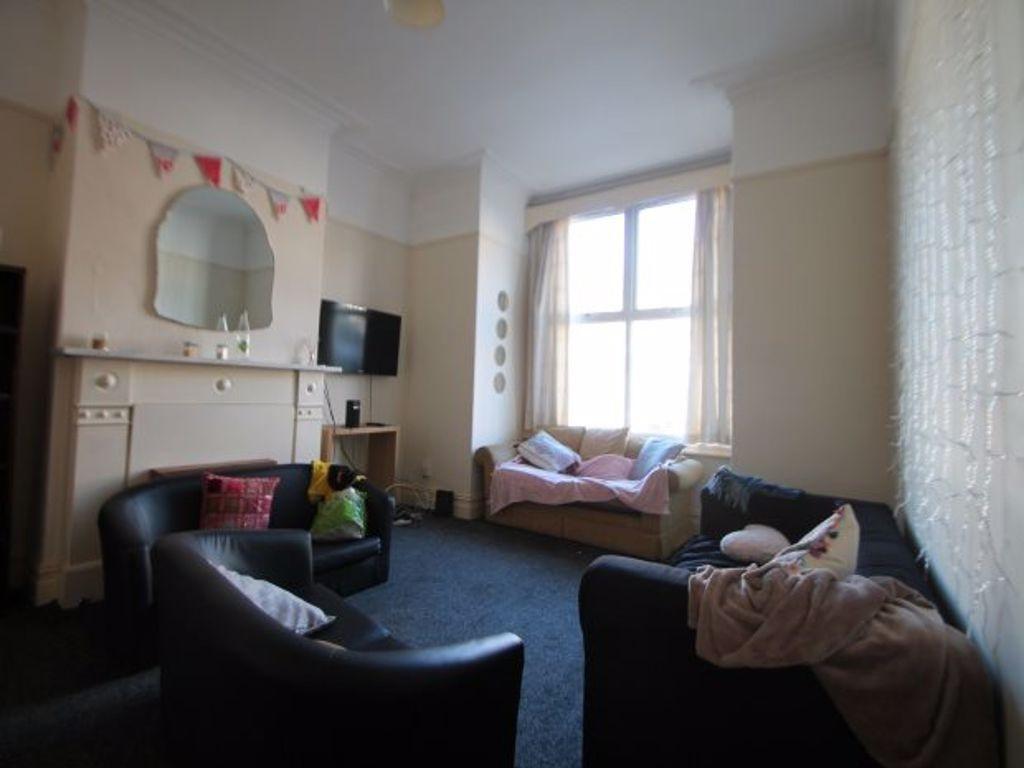 A cozy living room featuring comfortable seatin...