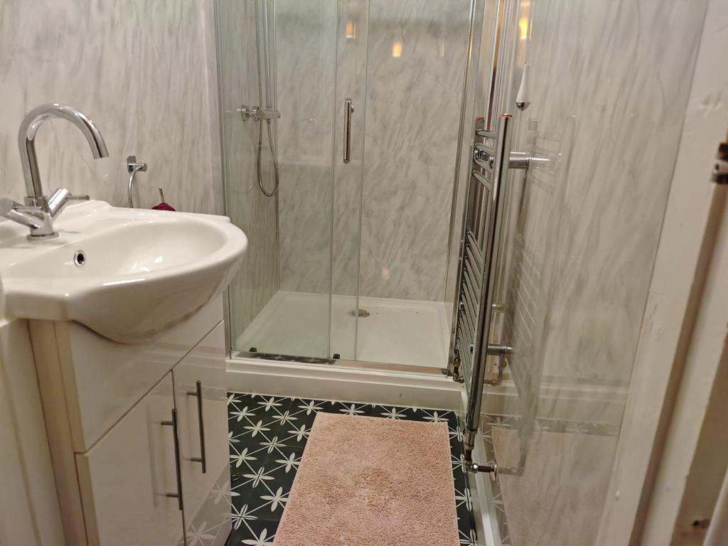 A modern, well-maintained bathroom featuring a ...