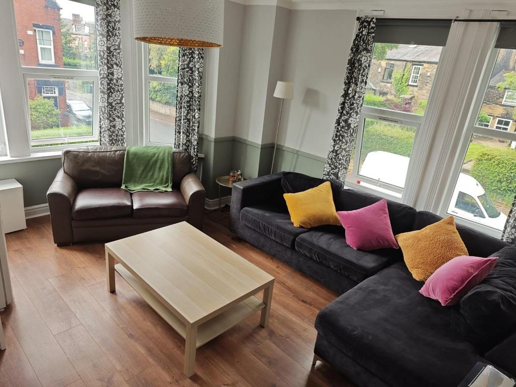 Bright and welcoming living room with comfortab...