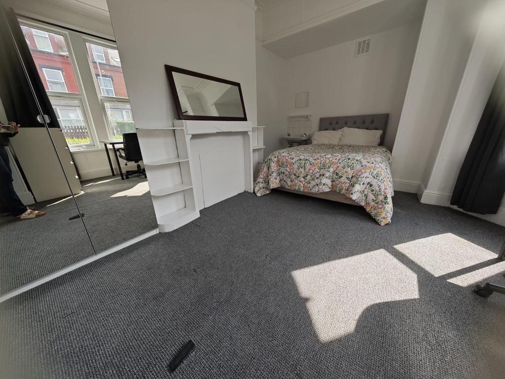 Bright and inviting double bedroom featuring a ...