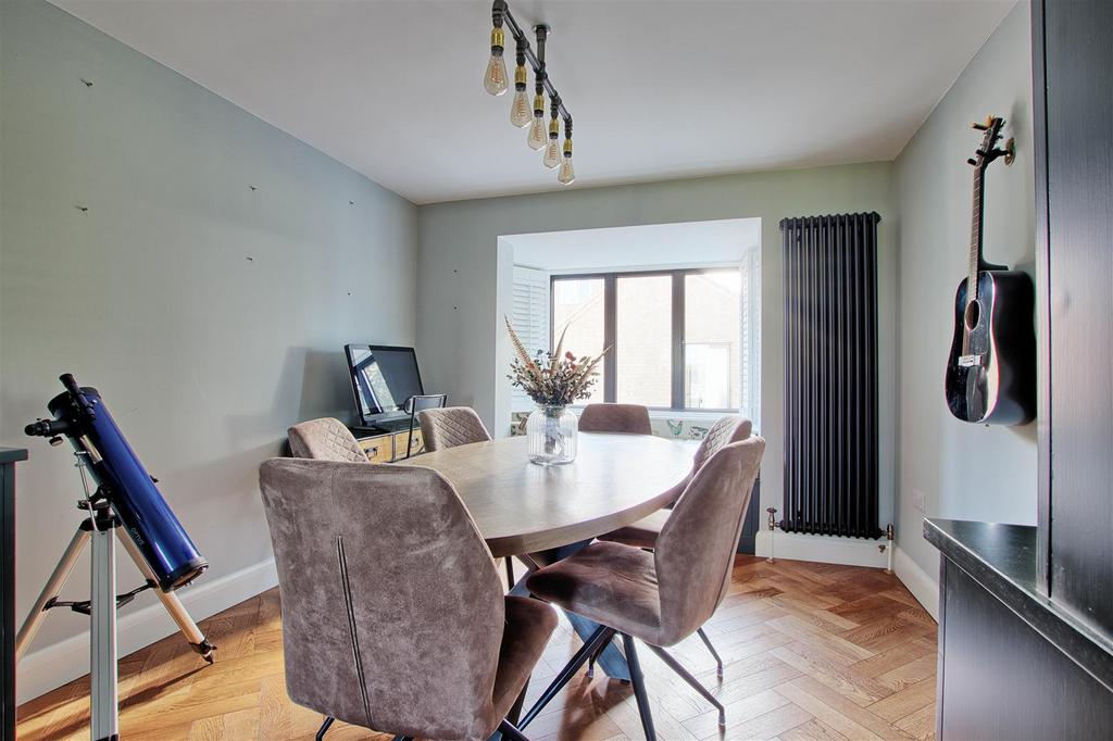 Dining room with sutters open.jpg