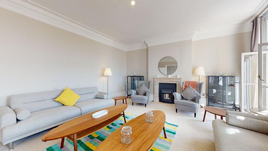 Bright and inviting living room featuring elega...