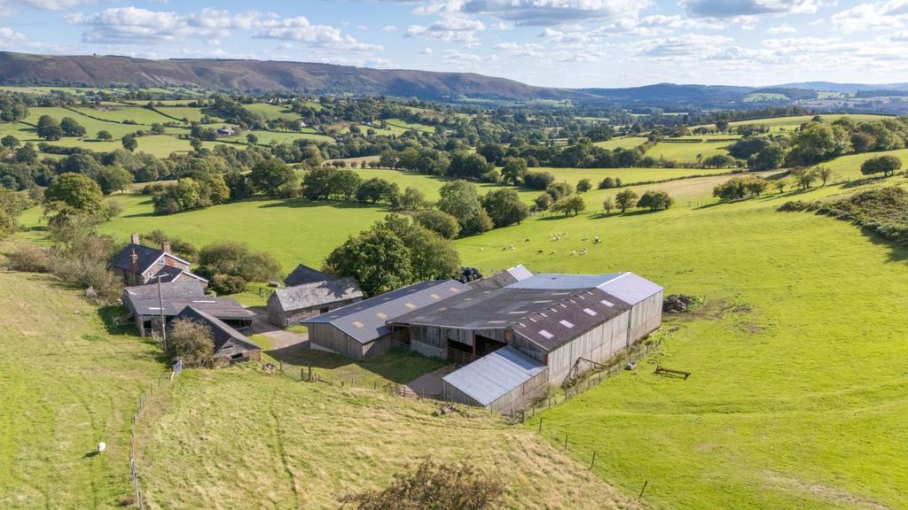 Side view of property buildings and land.jpg