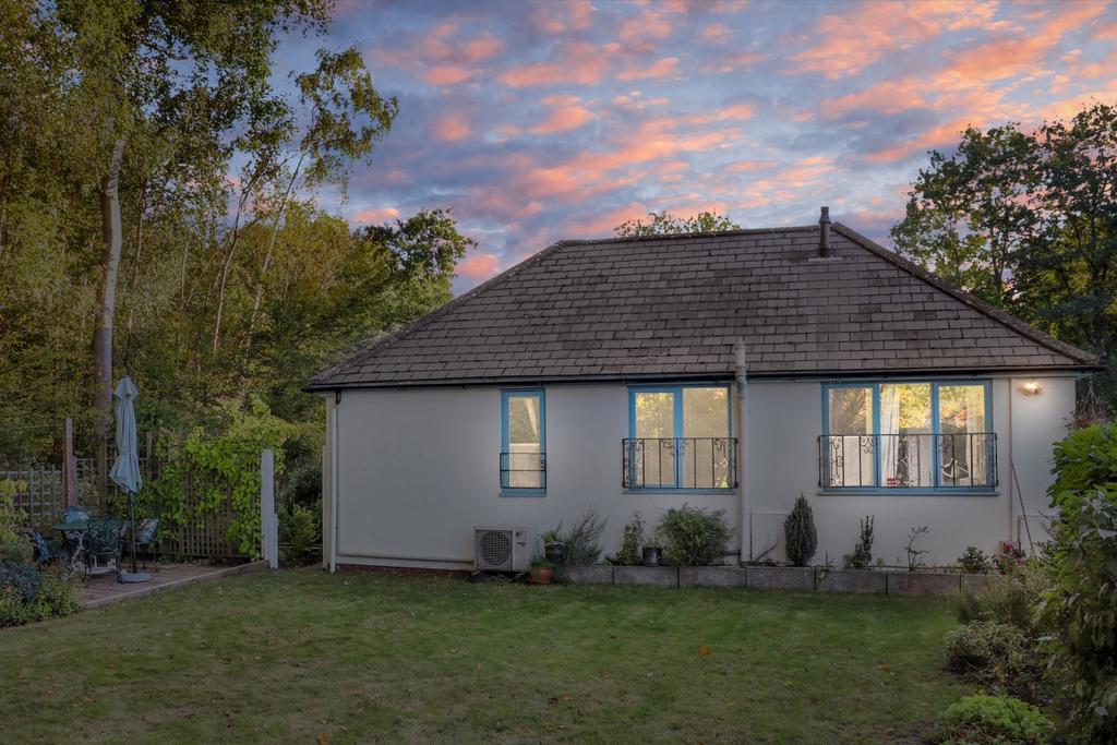 Side view of the property at dusk