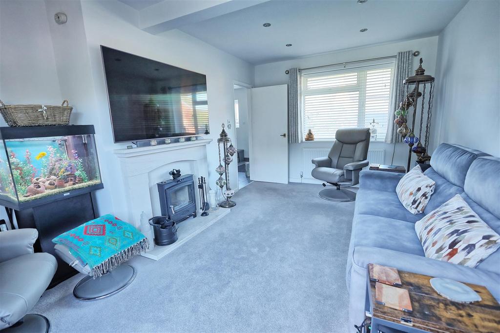 Living room with log burner