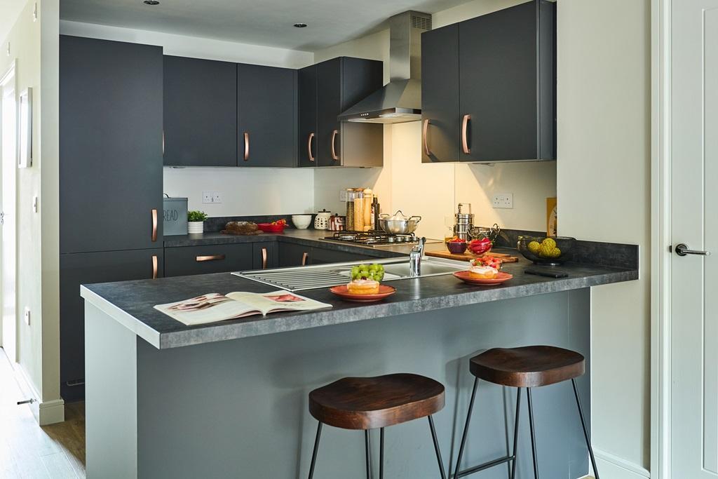 The peninsula island separates kitchen and...