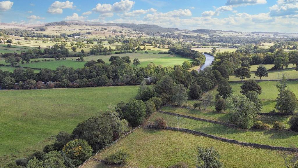 Elevated view of field and surrounding countryside