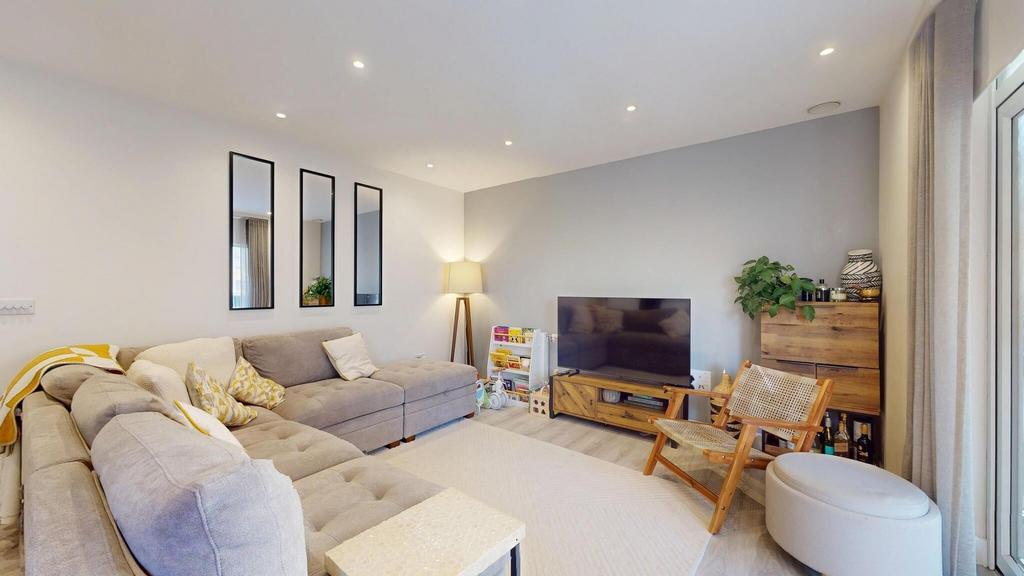 Bright and inviting living room featuring a spa...
