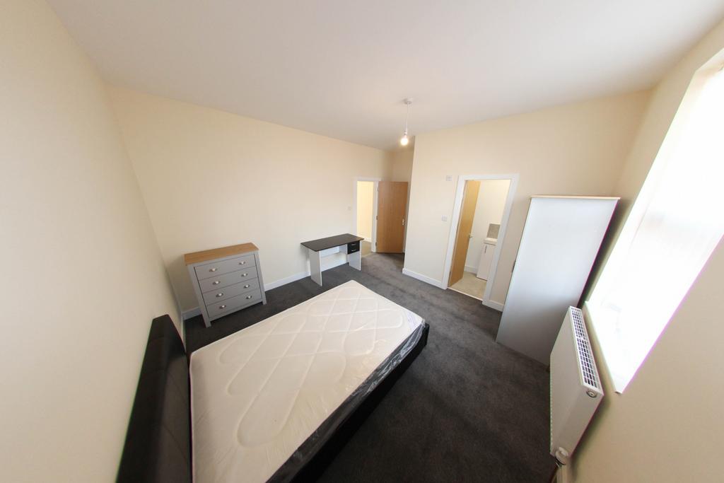 A clean and well-maintained small bathroom with...