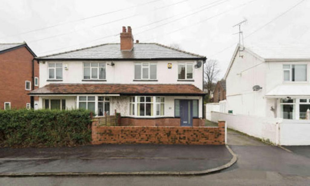 Appealing exterior shot showcasing the front of...