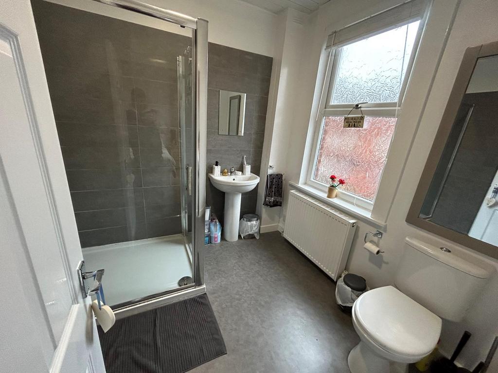A clean and well-maintained bathroom featuring ...