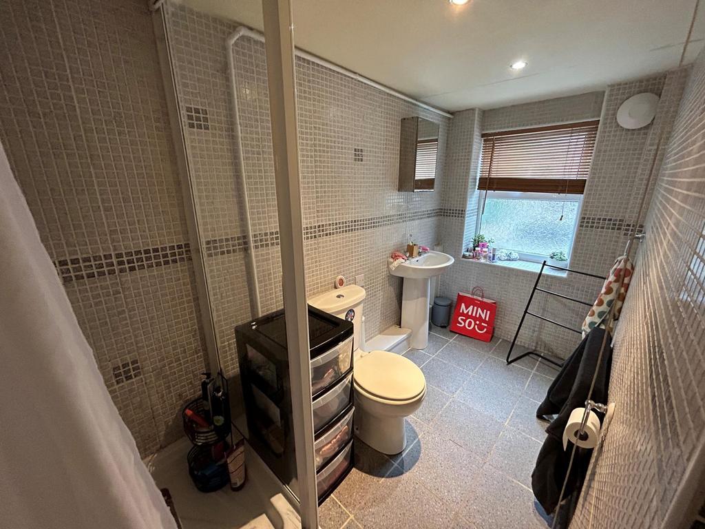 A clean, well-maintained bathroom with a large ...