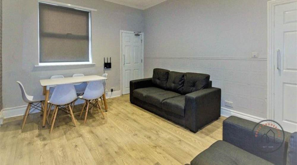 A modern and inviting living room with a sleek ...