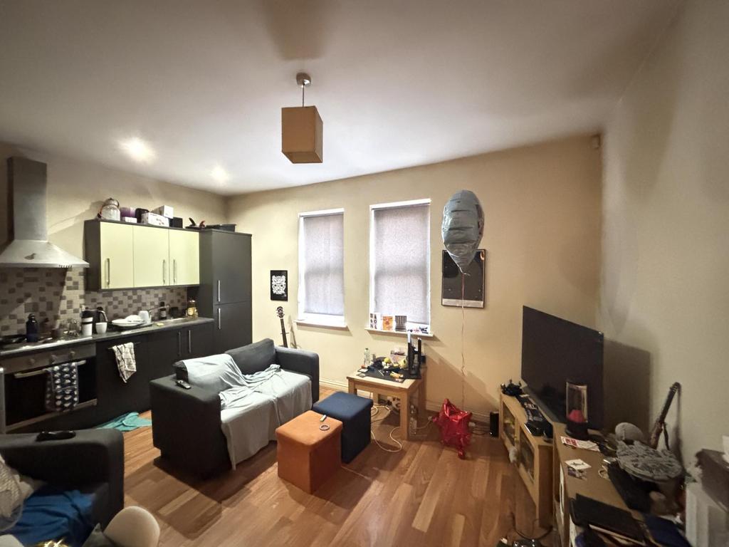 A cozy and inviting living room with comfortabl...