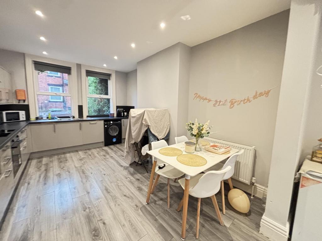 A bright and modern living room with ample natu...