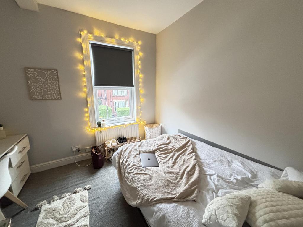 A clean and bright bathroom with good natural l...