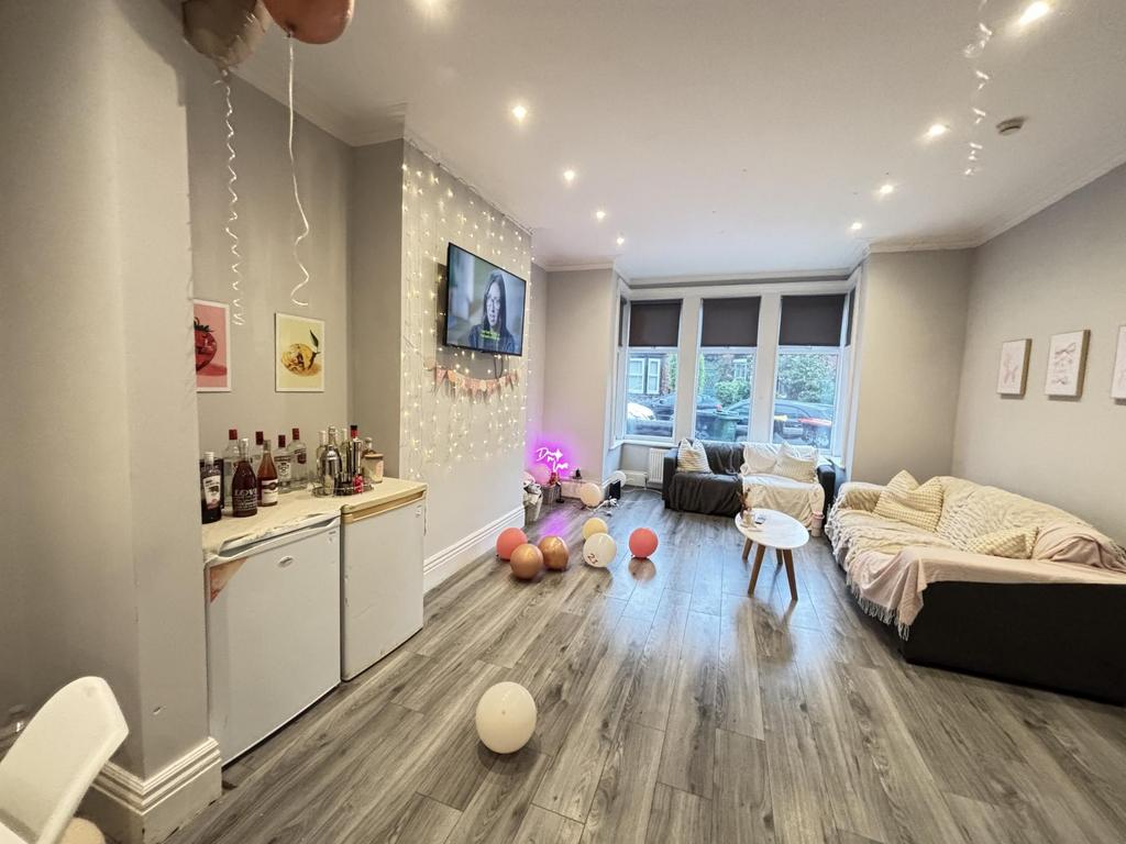 Bright and spacious living room with modern dec...