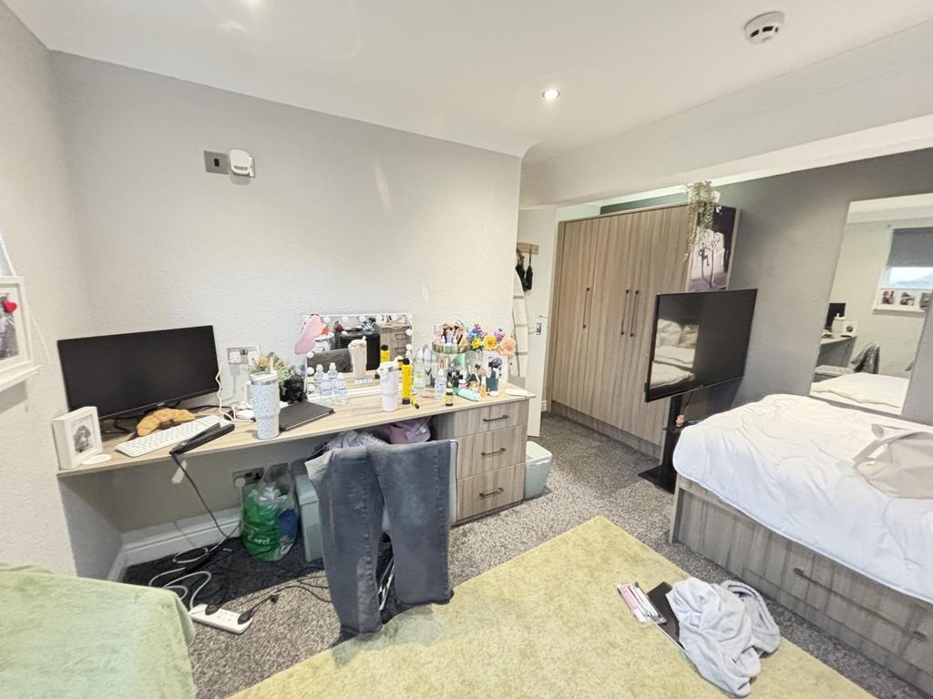 A bright and inviting living room with plenty o...