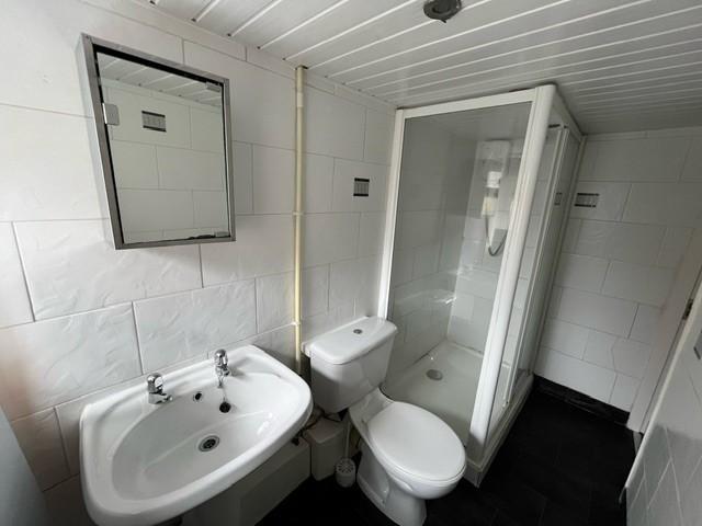 A clean and well-maintained bathroom featuring ...