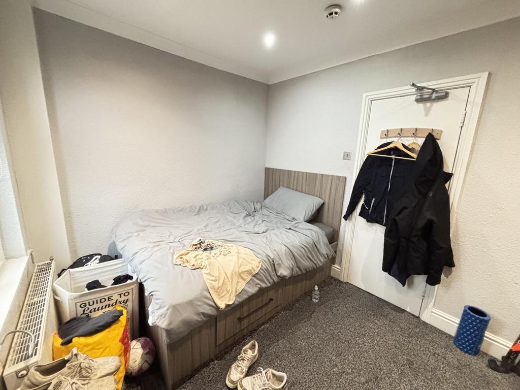 A functional double bedroom with a comfortable ...