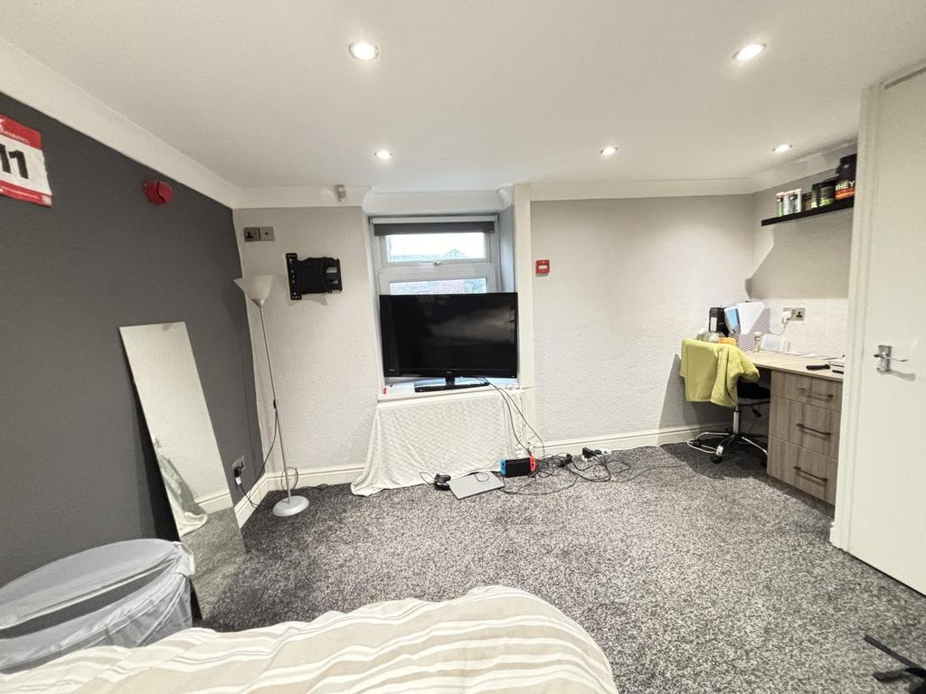 A bright and comfortable living room with ample...