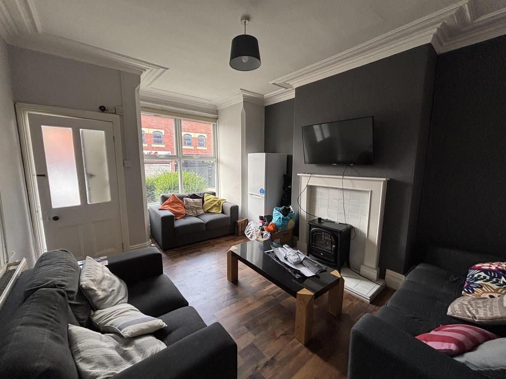 Bright and cozy living room featuring comfortab...