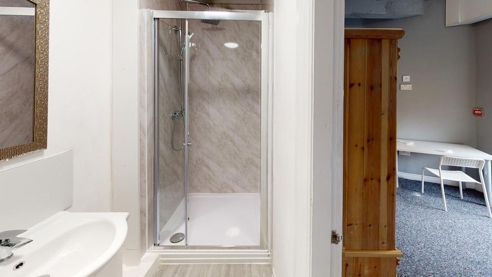 A clean and well-maintained bathroom featuring ...