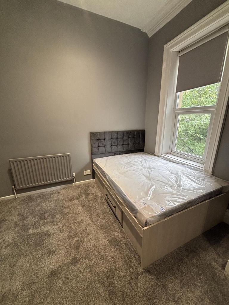 Bright, well-presented bedroom with a comfortab...