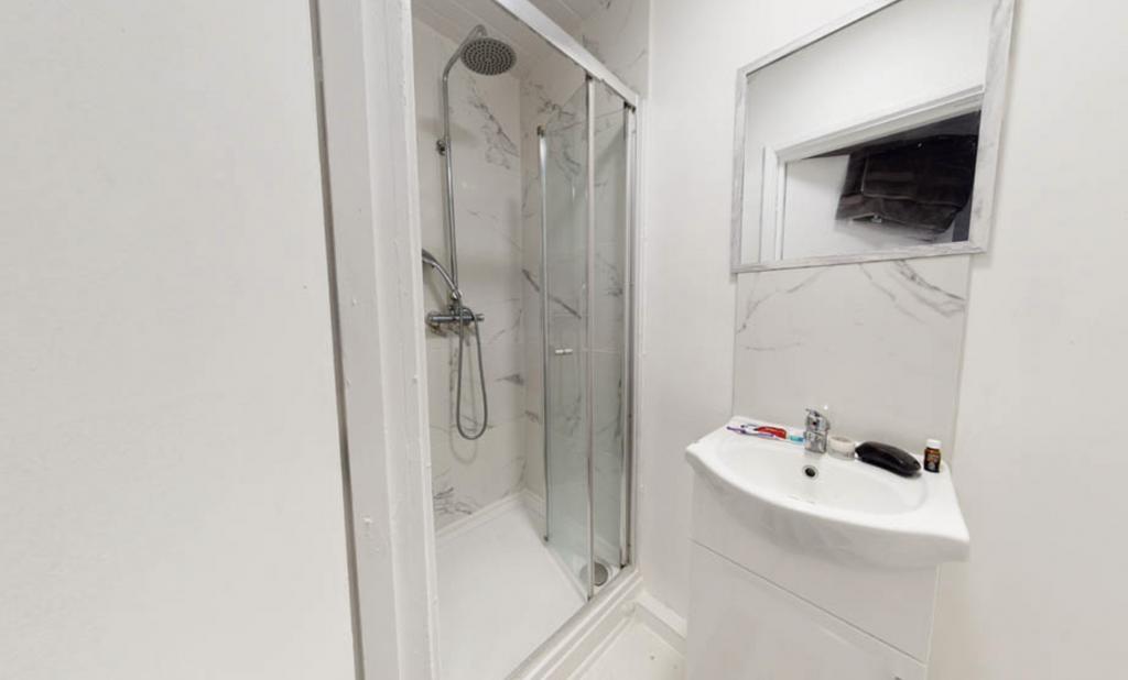 A clean and well-maintained bathroom featuring ...