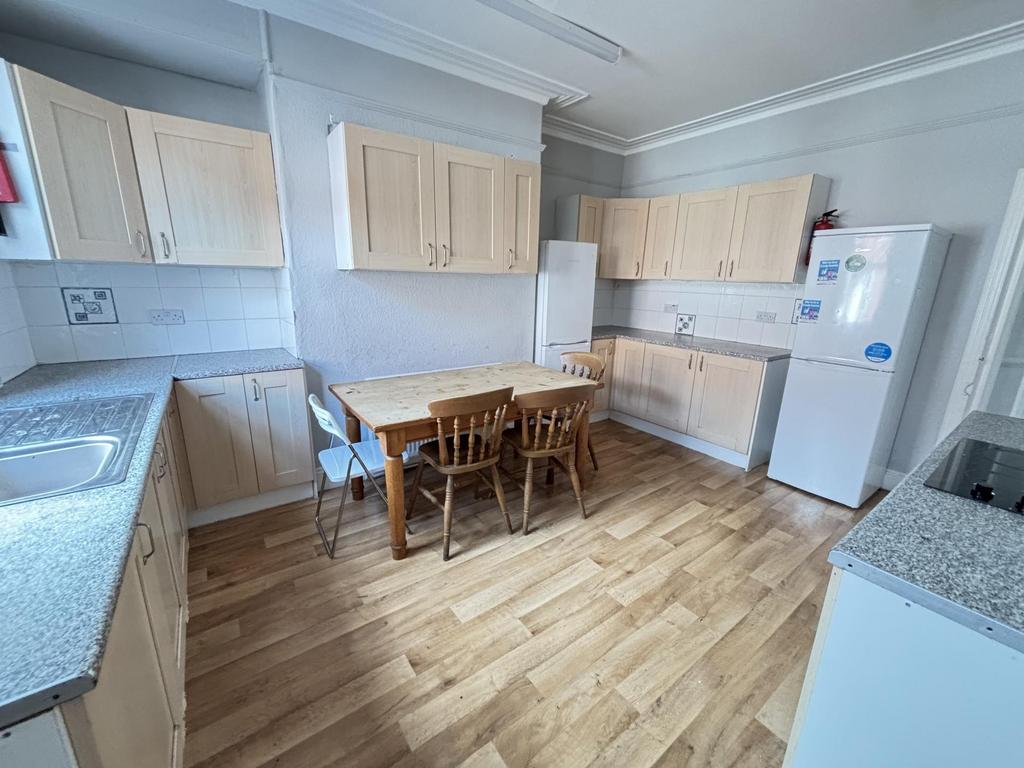 Bright and spacious kitchen with ample natural ...