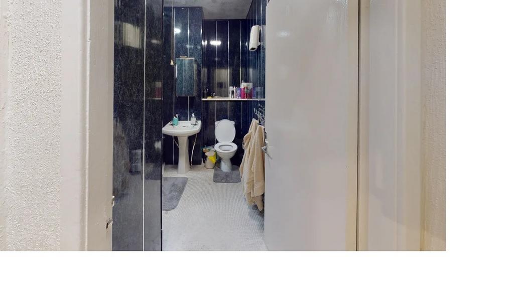 A clean, well-maintained bathroom with a spacio...