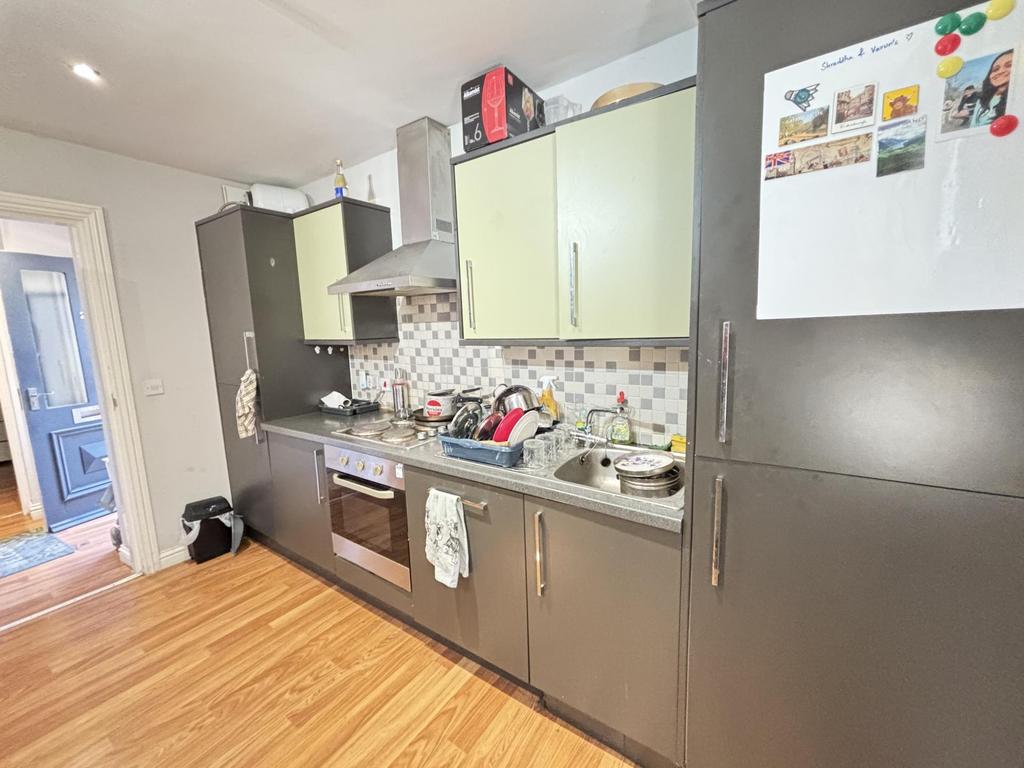A bright and well-maintained kitchen with moder...