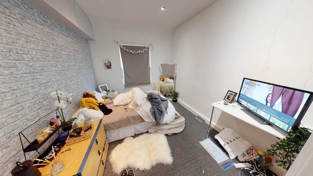 A spacious and inviting living room with ample ...