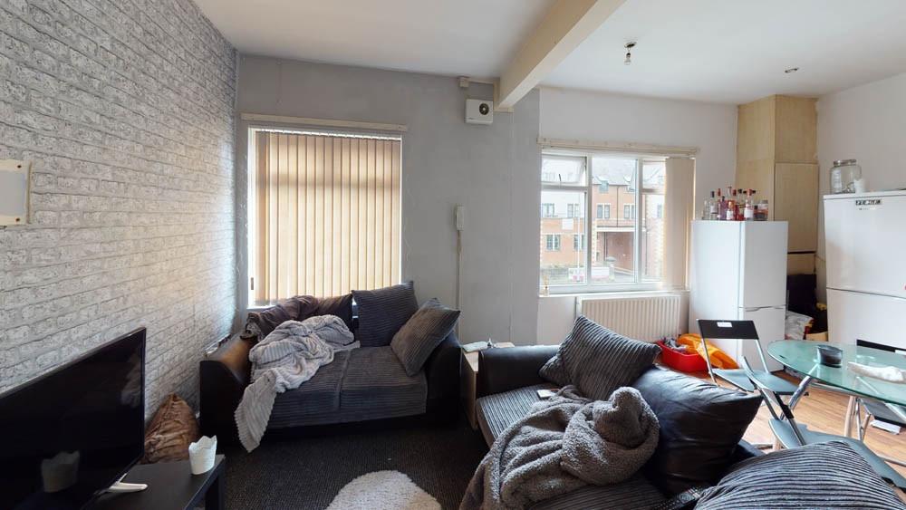 A modern and spacious living room filled with n...